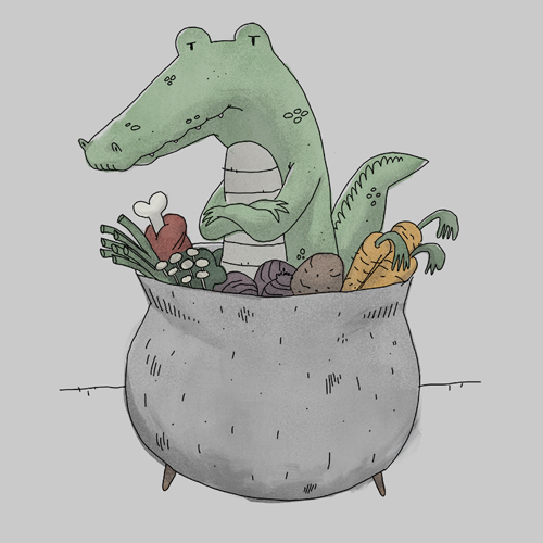 A crocodile in a cauldron with soup ingredients